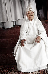 A woman at the Cao Dai temple in Vietnam