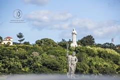 Statues of Jesus and Neptune in Havana.