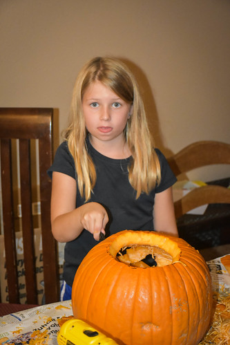 Nora with her pumpkin • <a style="font-size:0.8em;" href="http://www.flickr.com/photos/96277117@N00/23430871472/" target="_blank">View on Flickr</a>