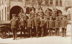Firemen in Uniform at Old Station with Fire Engine