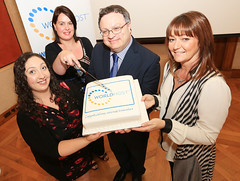Catherine Mawdesley from People 1st, Louise McKinstry from Tourism NI and Dr Stephen Farry joined Christine to celebrate her world class customer service training delivery to over 1,000 service professionals across Northern Ireland