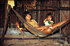 Martha, a Matses woman at home with her child - Amazon jungle, Peru